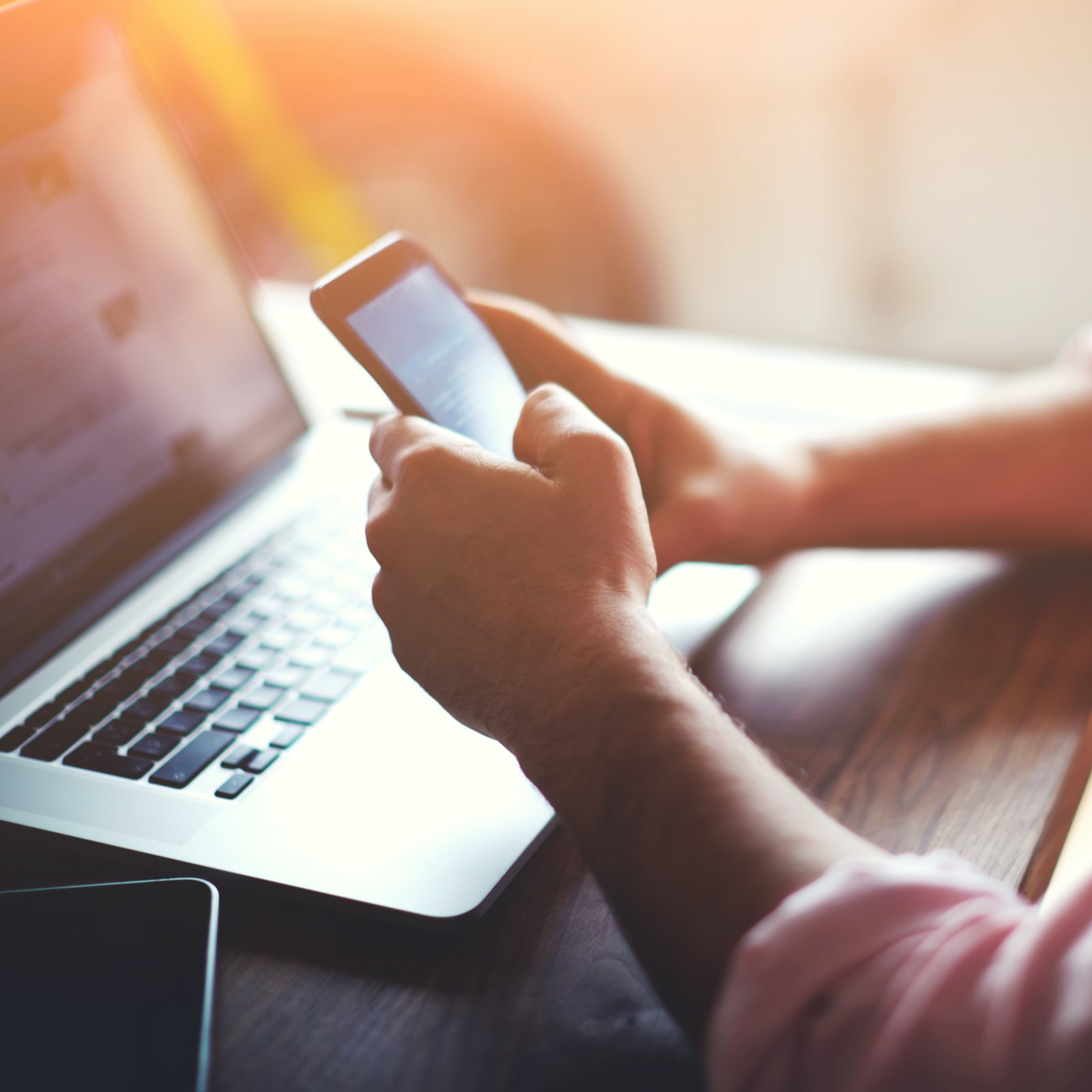 Customer browsing a Houston business's website on laptop and on mobile