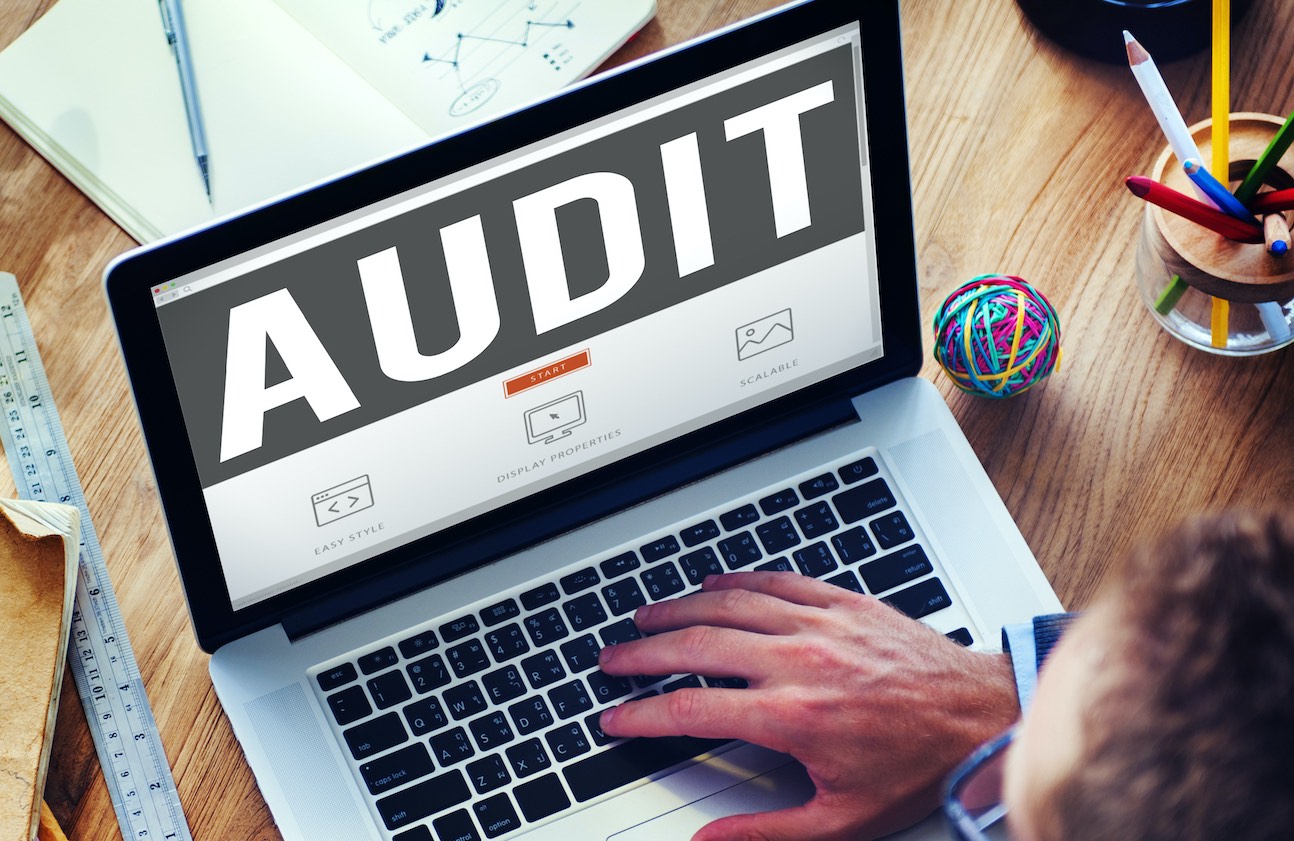 Marketer assessing Houston web design by completing a free website audit