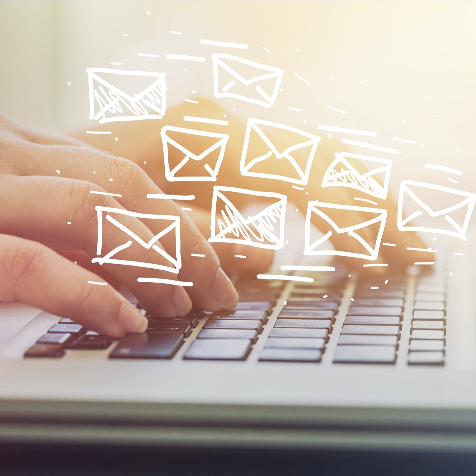 image of business owner sending marketing emails