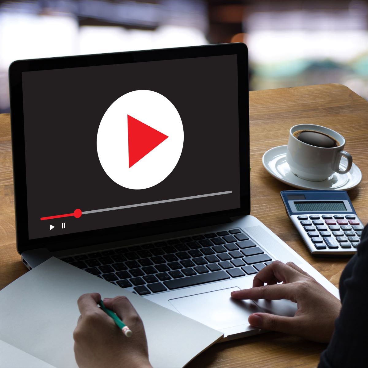 Laptop displaying video as part of a Houston digital marketing strategy.