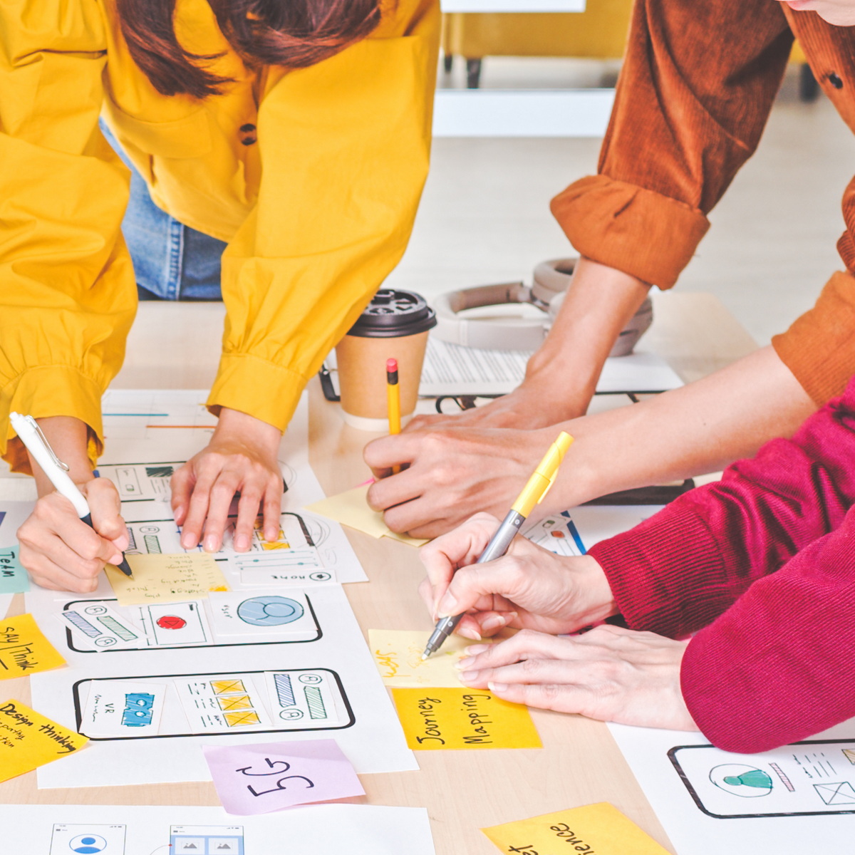Members of a cross-functional team from a Houston marketing agency formulating a Houston marketing strategy for a client.