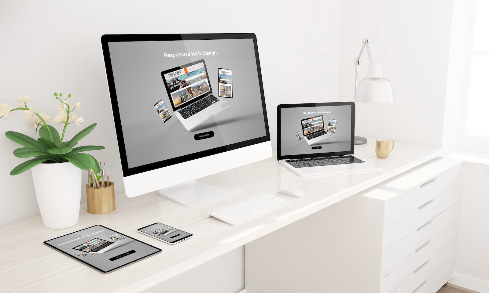clean computer set up on a responsive website